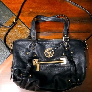 Black Michael Kors purse with gold hardware